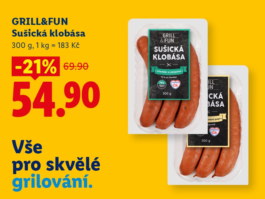 Reklamní banner z nabídky „Vše pro skvělé grilování“ zobrazuje dva balíčky Sušické klobásy značky GRILL&FUN (300 g) na žlutém pozadí. V levé části je uvedena slevová akce -21 %, nová cena 54,90 Kč (původně 69,90 Kč) a přepočet na kilogram (1 kg = 183 Kč). Vpravo jsou zobrazeny dvě balení klobás – jedno s příchutí Cheddar a Jalapeño a druhé se zeleným pepřem.