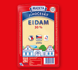 Vakuově balený plátkový Eidam v červeném obalu na červeném pozadí